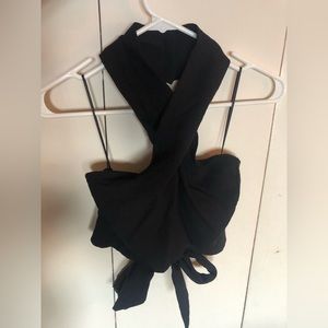 NWOT black halter cross neck crop top with tie back.
